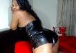 Queen mit Latex und glänzenden Stiefeln
